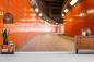 Preview: Fototapete gebogener Tunnel im 70er-Jahre Orange