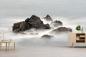 Preview: Fototapete Felsen ragen aus dunstigem Wasser