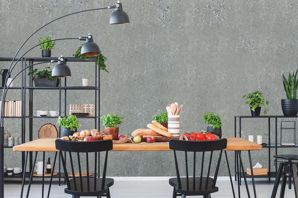 Vlies-Fototapete glatte graue Betonwand in einem Esszimmer
