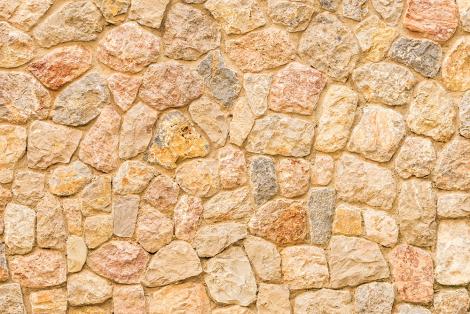 Steinoptik Fototapete mit einer mediterranen Steinmauer
